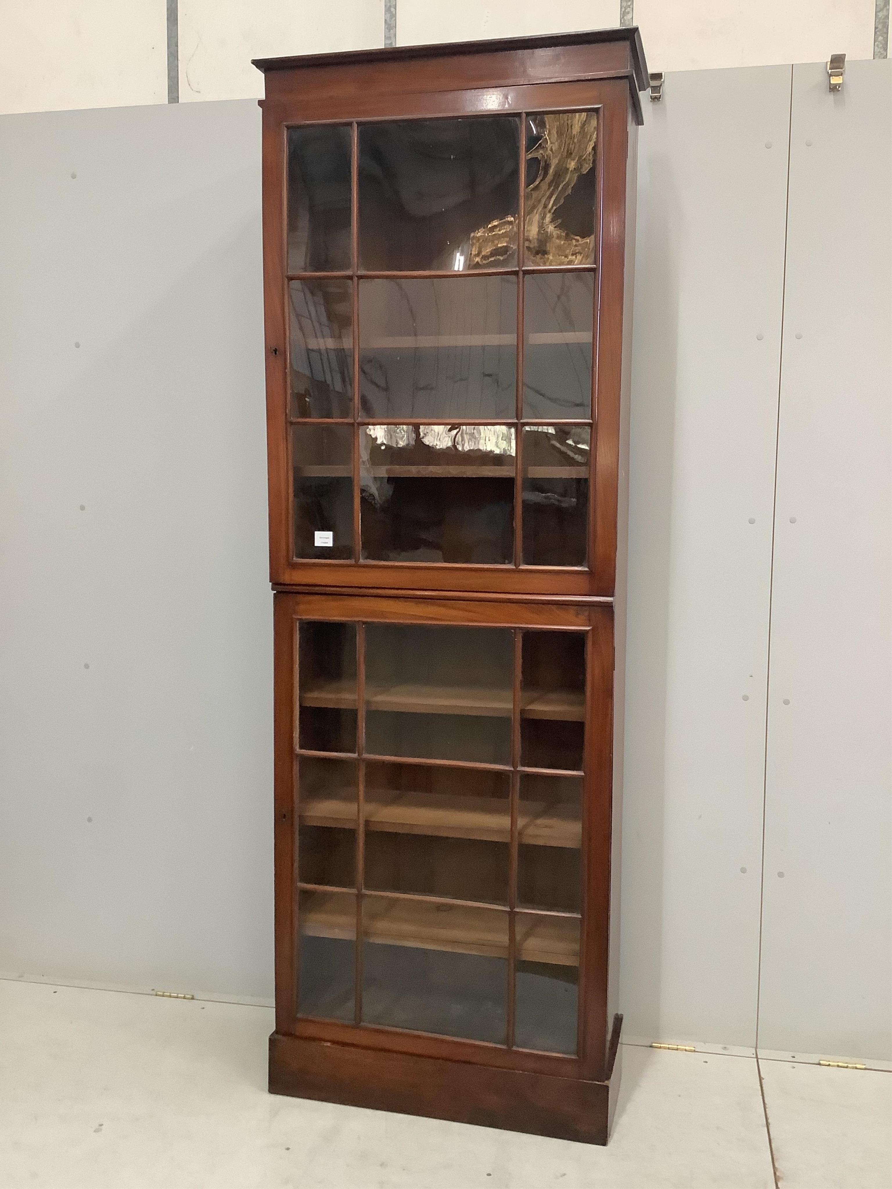 A Victorian mahogany narrow bookcase, width 76cm, depth 32cm, height 230cm. Condition - fair